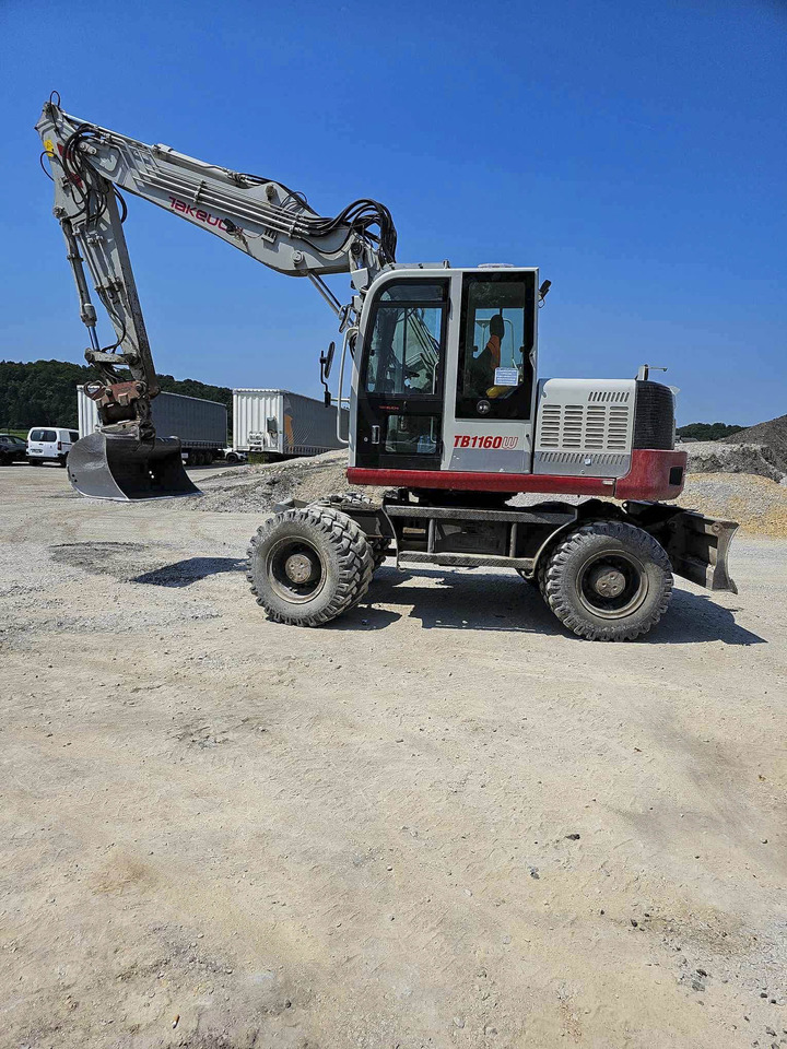 Takeuchi TB1160W - حفارة على عجلات: صور 3 Takeuchi TB1160W - حفارة على عجلات: صور 3