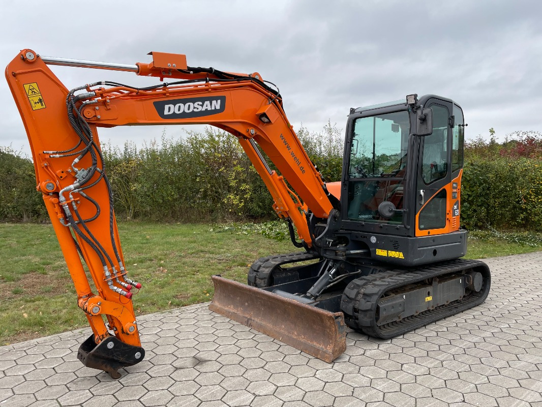 Doosan DX63-3 - حفارة مصغرة: صور 1 Doosan DX63-3 - حفارة مصغرة: صور 1