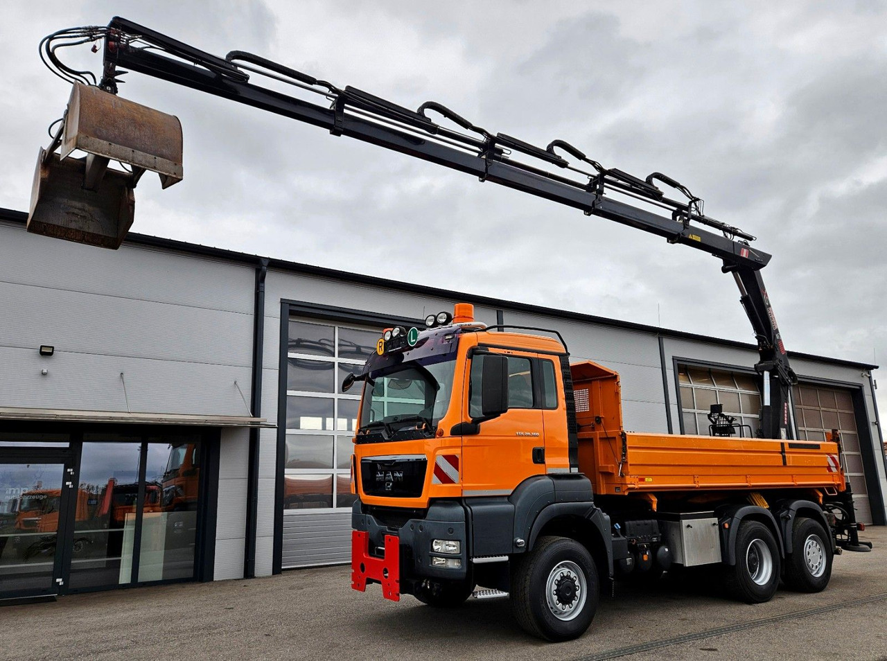 MAN TGS 28.360 6x4-4 HIAB 144E-4 Kran Euro5 - قلابات, شاحنة كرين: صور 1 MAN TGS 28.360 6x4-4 HIAB 144E-4 Kran Euro5 - قلابات, شاحنة كرين: صور 1