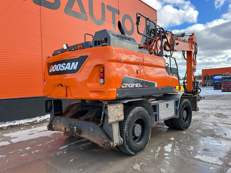 Doosan DX 210 W-5 ROTOTILT / AC / CENTRAL LUBRICATION / WEBASTO - حفارة على عجلات: صور 5 Doosan DX 210 W-5 ROTOTILT / AC / CENTRAL LUBRICATION / WEBASTO - حفارة على عجلات: صور 5