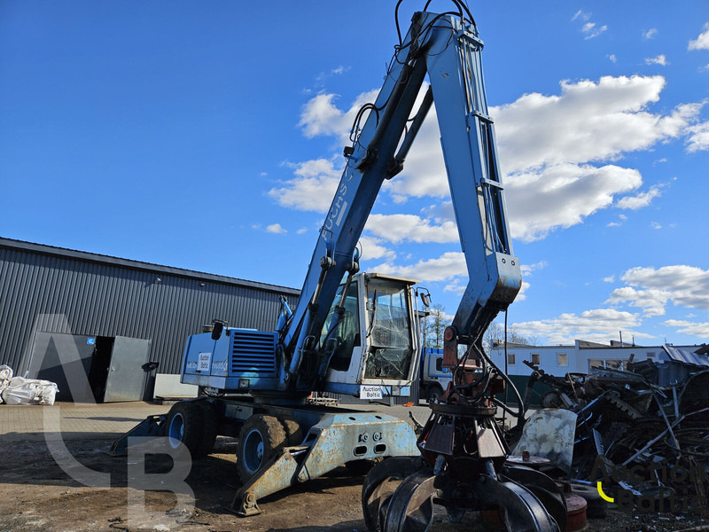 Fuchs MHL 320 - حفارة على عجلات: صور 2 Fuchs MHL 320 - حفارة على عجلات: صور 2