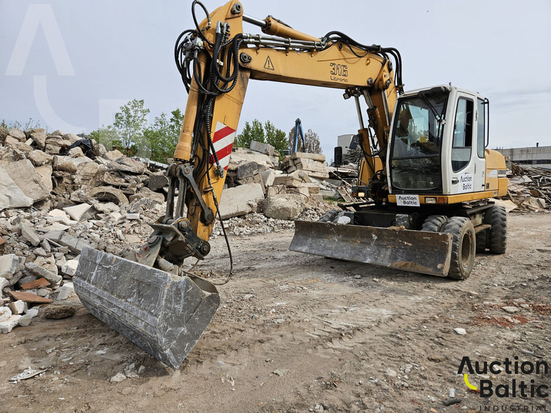 Liebherr A 316 Litronic - حفارة على عجلات: صور 1 Liebherr A 316 Litronic - حفارة على عجلات: صور 1