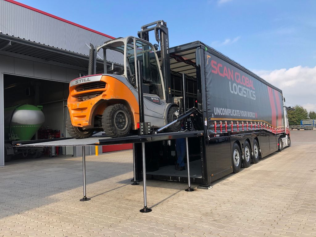 Innenlader Zwischenlader Gabelstaplertransporter - عربة مسطحة منخفضة نصف مقطورة: صور 5 Innenlader Zwischenlader Gabelstaplertransporter - عربة مسطحة منخفضة نصف مقطورة: صور 5