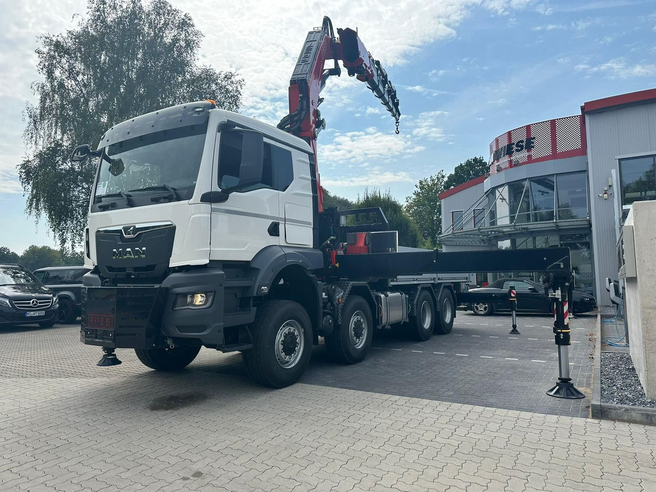 MAN TGS 41.520 8x8 mit Fassi Ladekran F710RA.2.26 - شاحنات مسطحة: صور 2 MAN TGS 41.520 8x8 mit Fassi Ladekran F710RA.2.26 - شاحنات مسطحة: صور 2