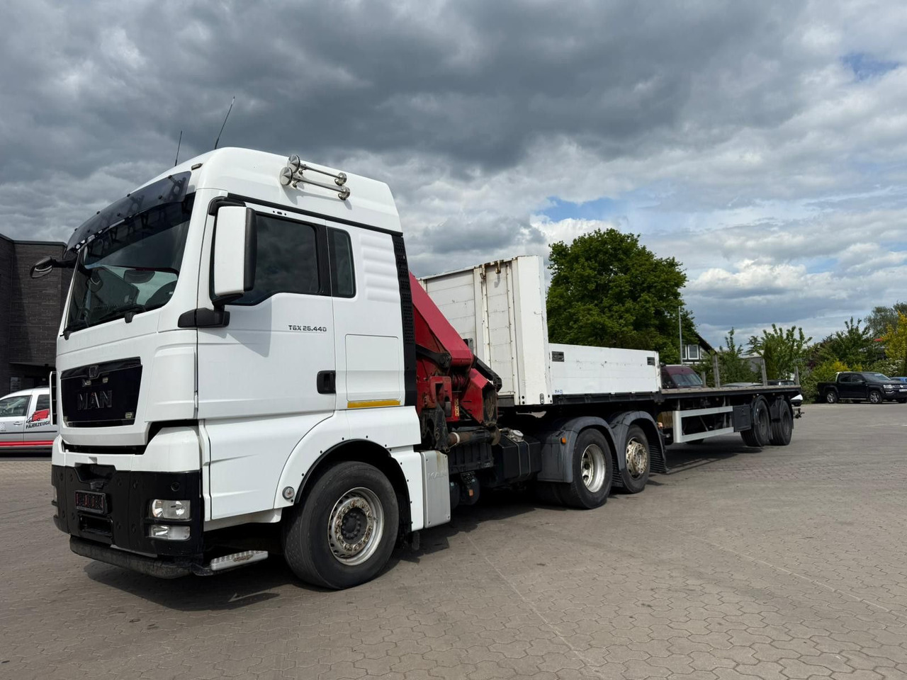MAN TGX 26.440 6x2 mit HMF 3000-5 Kran - شاحنة جرار: صور 2 MAN TGX 26.440 6x2 mit HMF 3000-5 Kran - شاحنة جرار: صور 2