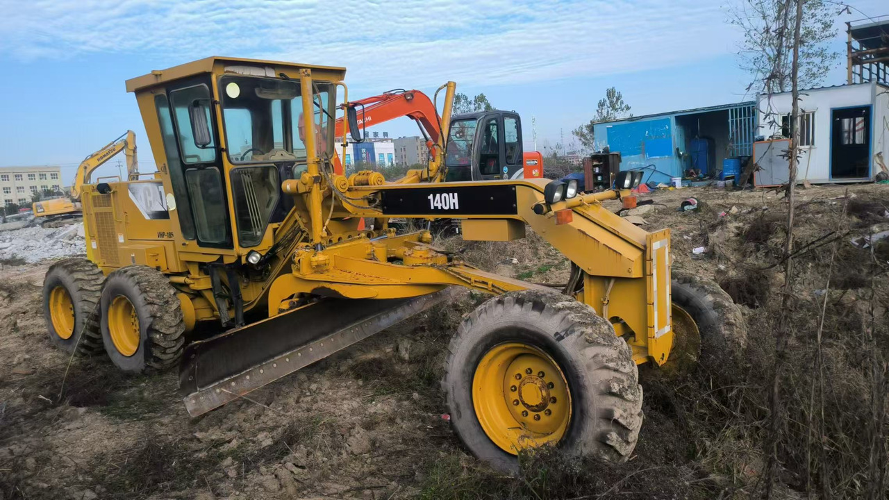 CATERPILLAR 140H - آلة تسوية الأرض: صور 1 CATERPILLAR 140H - آلة تسوية الأرض: صور 1