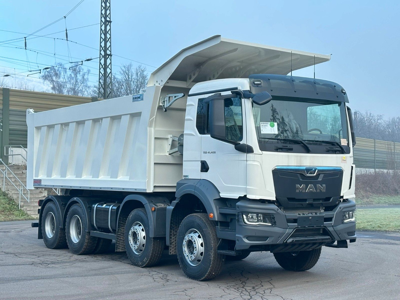 MAN TGS 41.400 8x4 / EUROMIX MTP 23m³/ Eckige Mulde MAN TGS 41.400 8x4 / EUROMIX MTP 23m³/ Eckige Mulde - قلابات: صور 4 MAN TGS 41.400 8x4 / EUROMIX MTP 23m³/ Eckige Mulde MAN TGS 41.400 8x4 / EUROMIX MTP 23m³/ Eckige Mulde - قلابات: صور 4