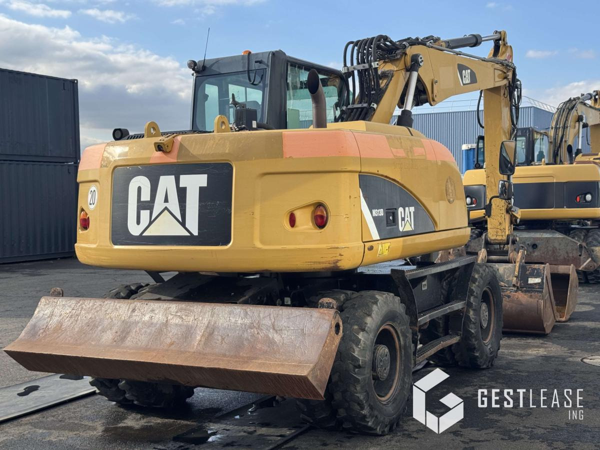 Caterpillar M313D - حفارة على عجلات: صور 3 Caterpillar M313D - حفارة على عجلات: صور 3