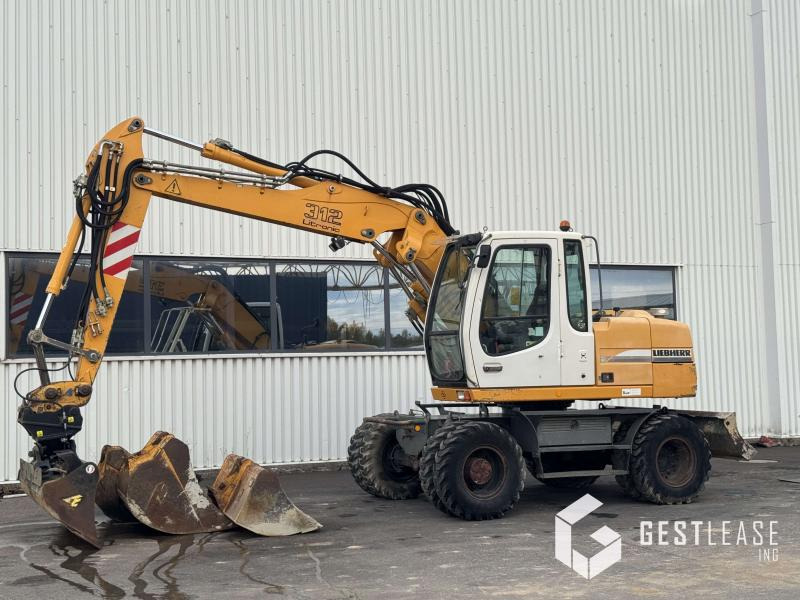 Liebherr A312 Litronic - حفارة على عجلات: صور 1 Liebherr A312 Litronic - حفارة على عجلات: صور 1