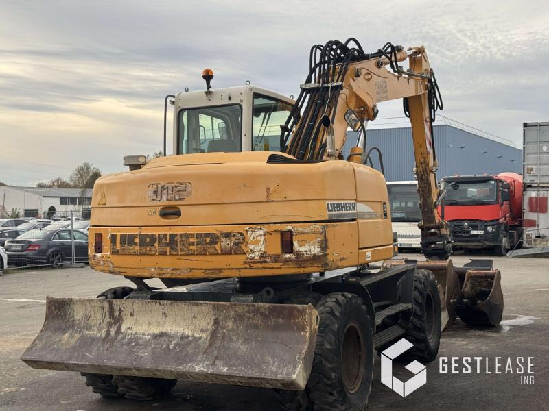 Liebherr A312 Litronic - حفارة على عجلات: صور 3 Liebherr A312 Litronic - حفارة على عجلات: صور 3