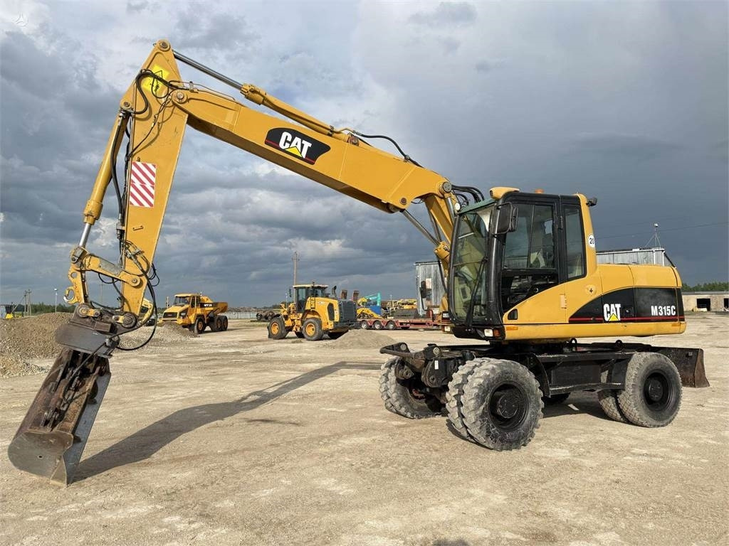 CAT M315C - حفارة على عجلات: صور 3 CAT M315C - حفارة على عجلات: صور 3
