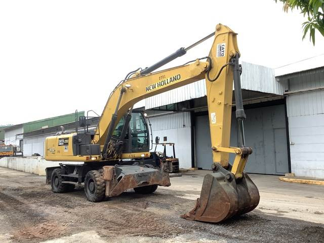 New Holland WE210 - حفارة على عجلات: صور 4 New Holland WE210 - حفارة على عجلات: صور 4