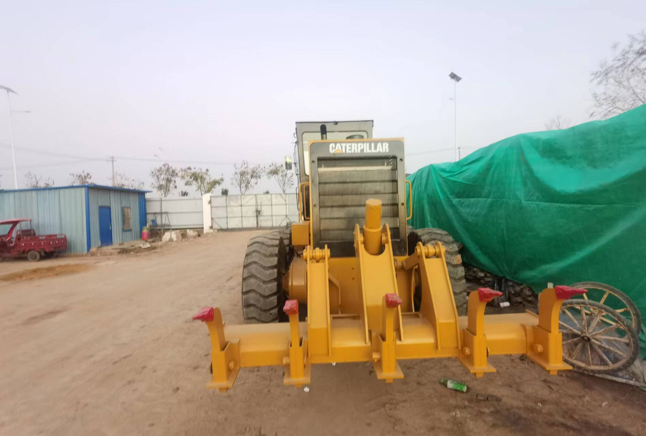 Caterpillar 140G - آلة تسوية الأرض: صور 3 Caterpillar 140G - آلة تسوية الأرض: صور 3