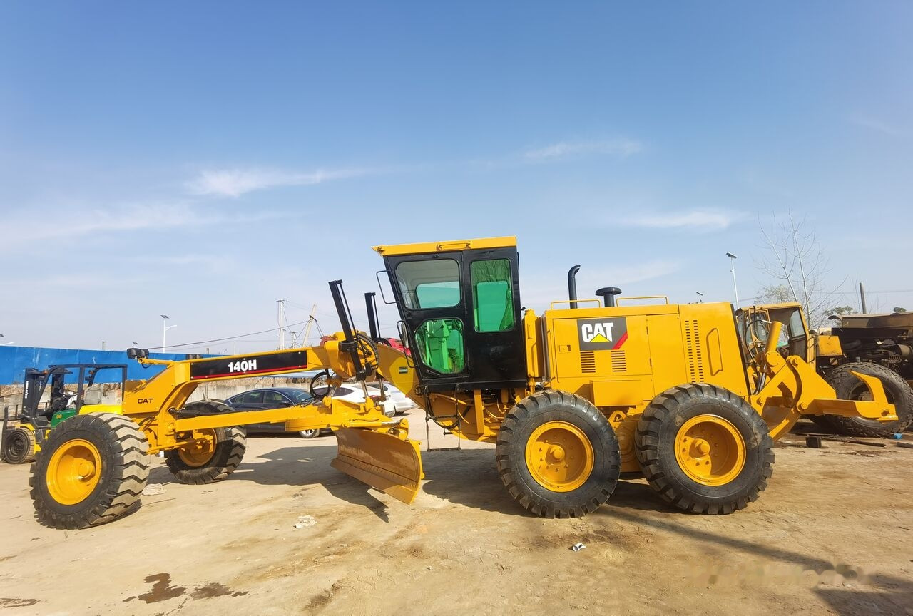 Caterpillar 140H - آلة تسوية الأرض: صور 1 Caterpillar 140H - آلة تسوية الأرض: صور 1
