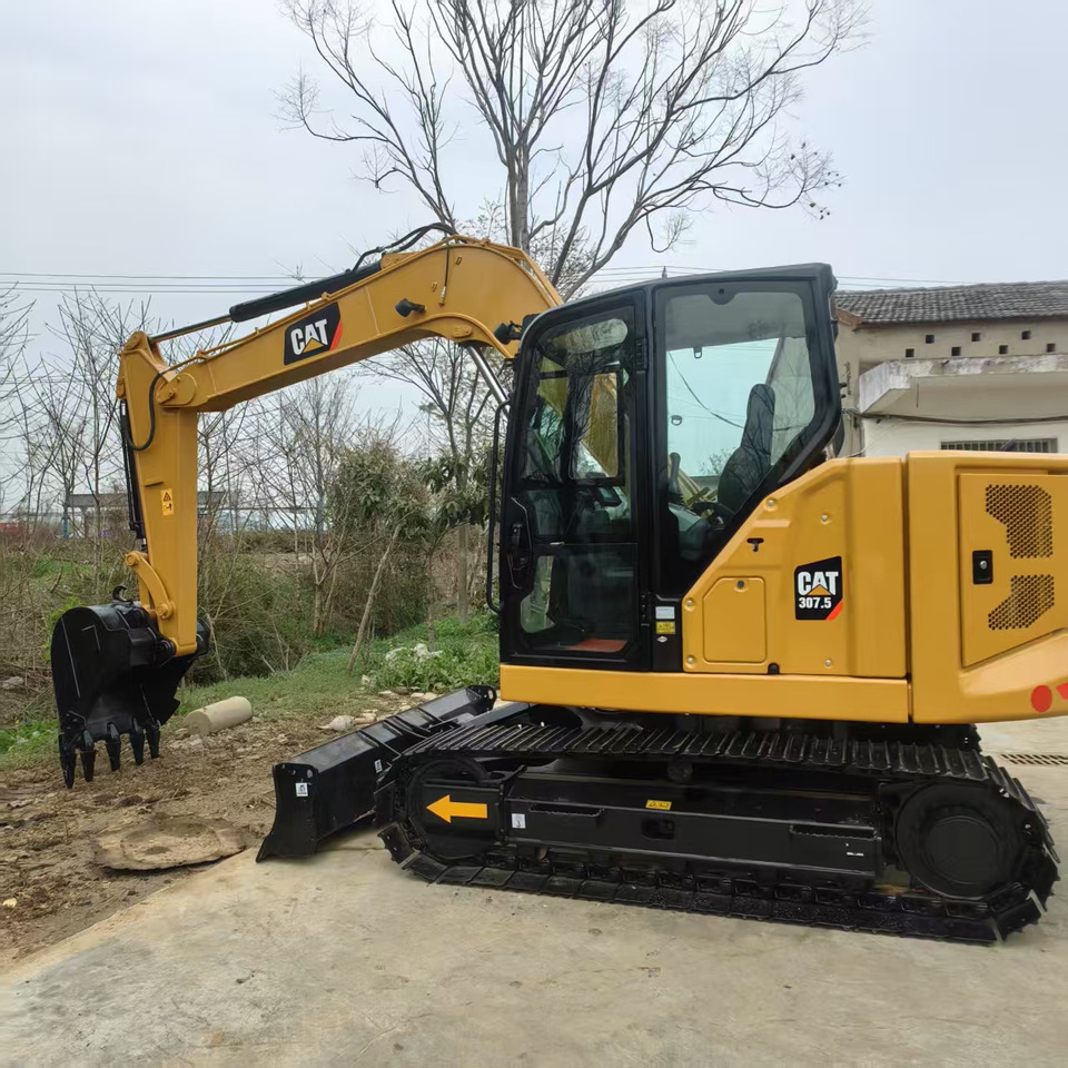 Caterpillar 307.5 - آلات البناء: صور 1 Caterpillar 307.5 - آلات البناء: صور 1