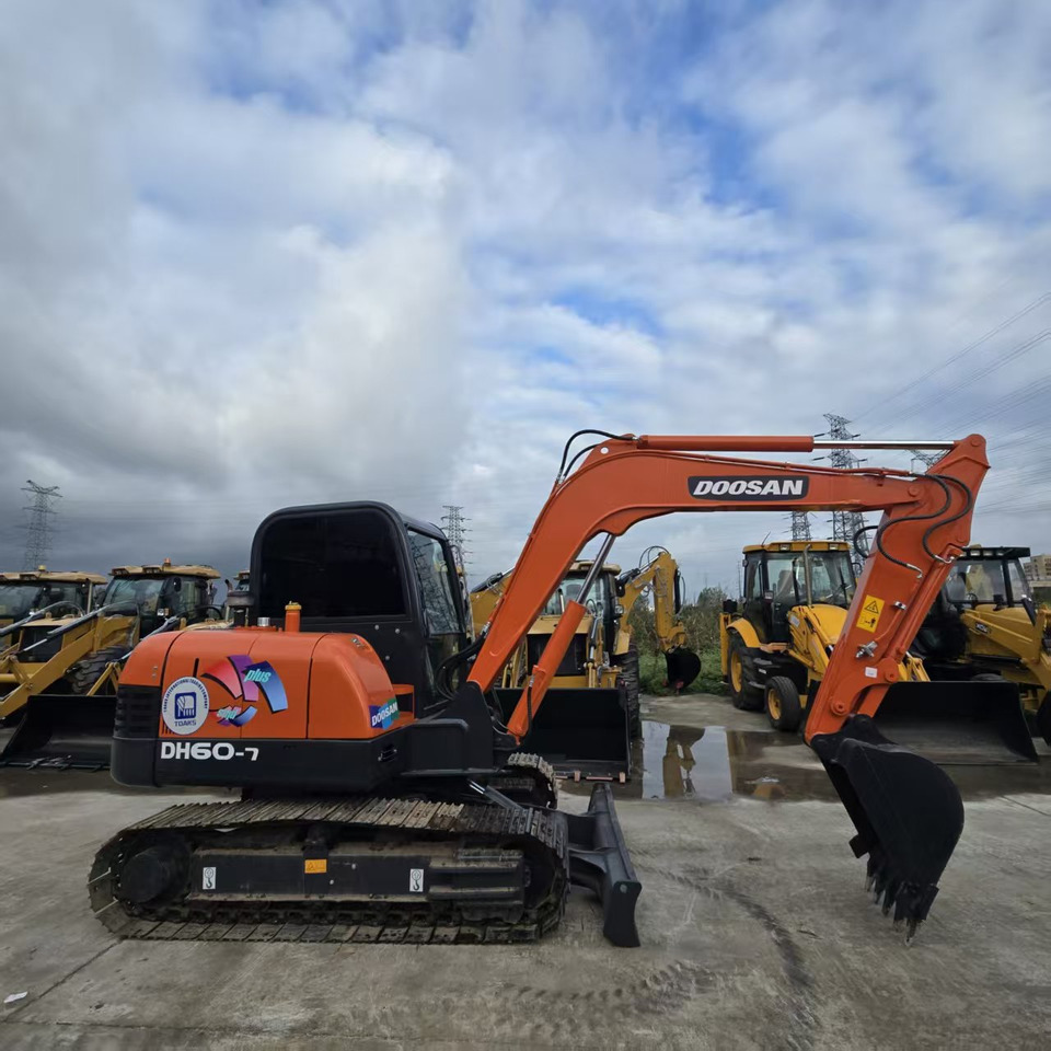 DOOSAN DH60 - حفارة مصغرة: صور 1 DOOSAN DH60 - حفارة مصغرة: صور 1