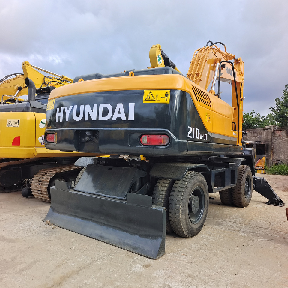 HYUNDAI 210W-9T - حفارة على عجلات: صور 1 HYUNDAI 210W-9T - حفارة على عجلات: صور 1