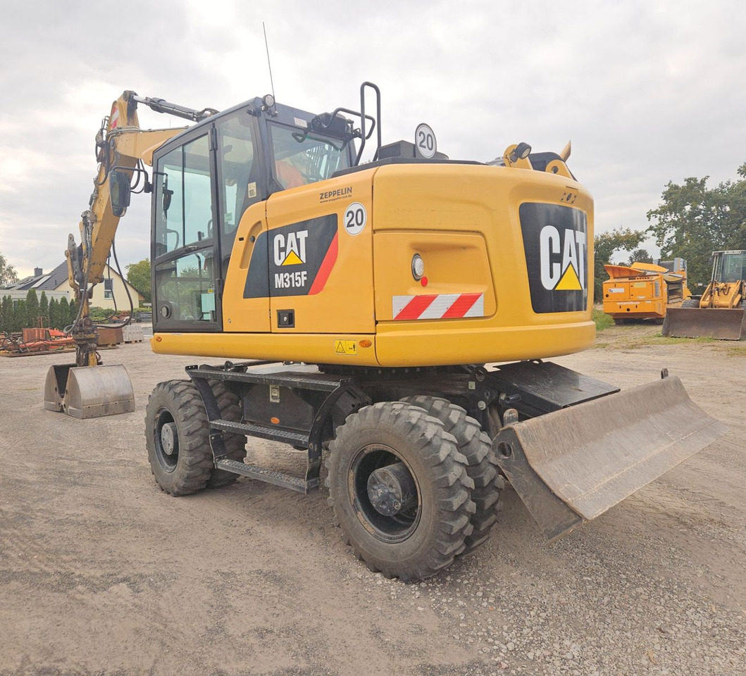 CAT M315F, orig. 2.828h - حفارة على عجلات: صور 2 CAT M315F, orig. 2.828h - حفارة على عجلات: صور 2
