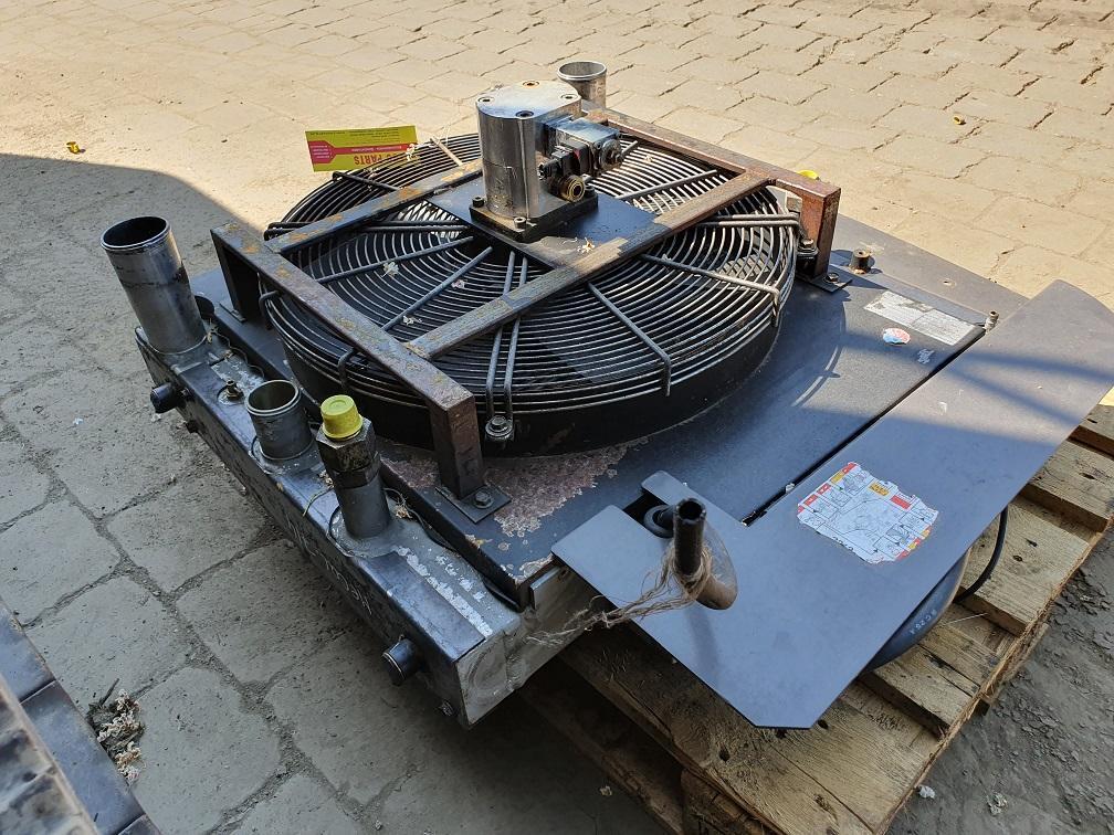 Mecalac 714 MW - نظام التبريد - آلات البناء: صور 4 Mecalac 714 MW - نظام التبريد - آلات البناء: صور 4