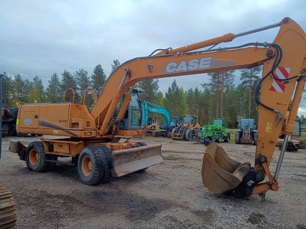 Case WX210 PYÖRITTÄJÄLLÄ - حفارة على عجلات: صور 5 Case WX210 PYÖRITTÄJÄLLÄ - حفارة على عجلات: صور 5