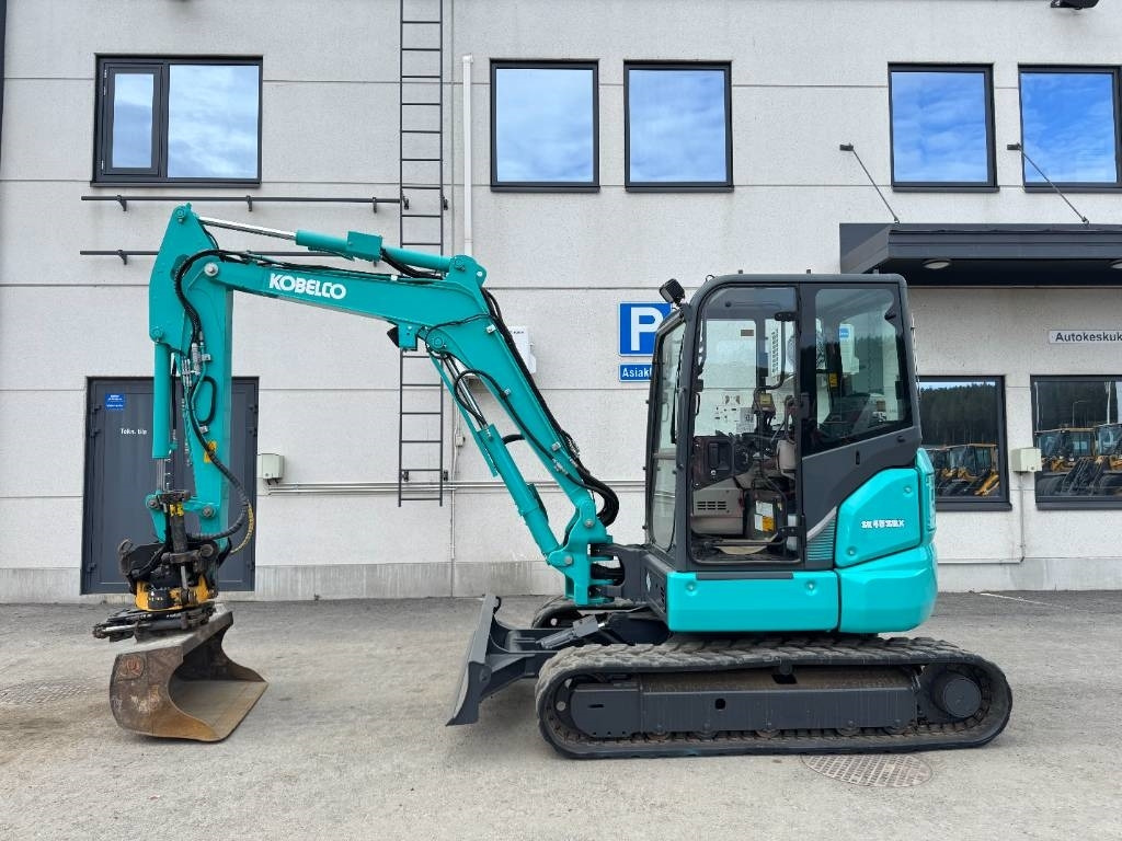 Kobelco SK45SRX-6 Pyörittäjä pihdeillä - حفارة مصغرة: صور 1 Kobelco SK45SRX-6 Pyörittäjä pihdeillä - حفارة مصغرة: صور 1