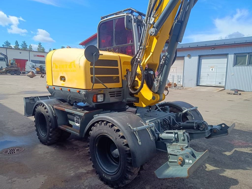 Wacker Neuson EW100 PYÖRITTÄJÄLLÄ - حفارة على عجلات: صور 4 Wacker Neuson EW100 PYÖRITTÄJÄLLÄ - حفارة على عجلات: صور 4