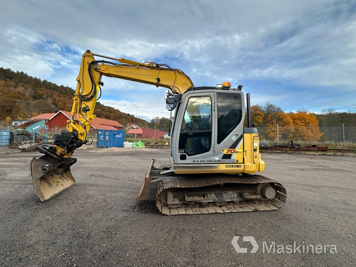 Grävmaskin New Holland Kobelco E70BSR-2 - حفارات زحافة: صور 5 Grävmaskin New Holland Kobelco E70BSR-2 - حفارات زحافة: صور 5