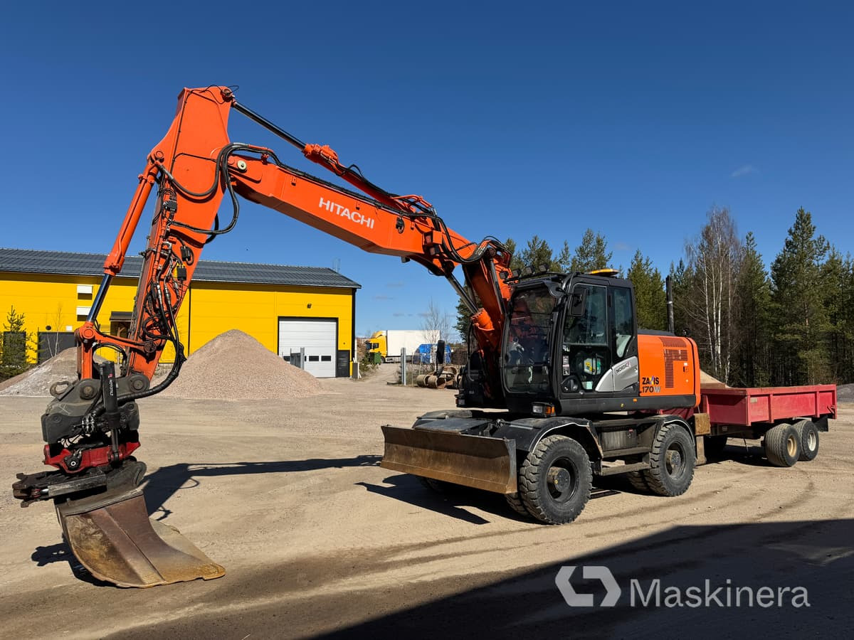 Hitachi ZX170W-5B Hjulgrävare Hitachi ZX170W med vagn - حفارات زحافة: صور 1 Hitachi ZX170W-5B Hjulgrävare Hitachi ZX170W med vagn - حفارات زحافة: صور 1