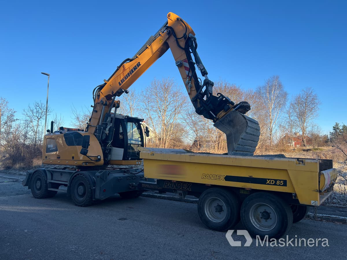 Hjulgrävare Liebherr 918 Compact Litronic med kärra - حفارات زحافة: صور 1 Hjulgrävare Liebherr 918 Compact Litronic med kärra - حفارات زحافة: صور 1