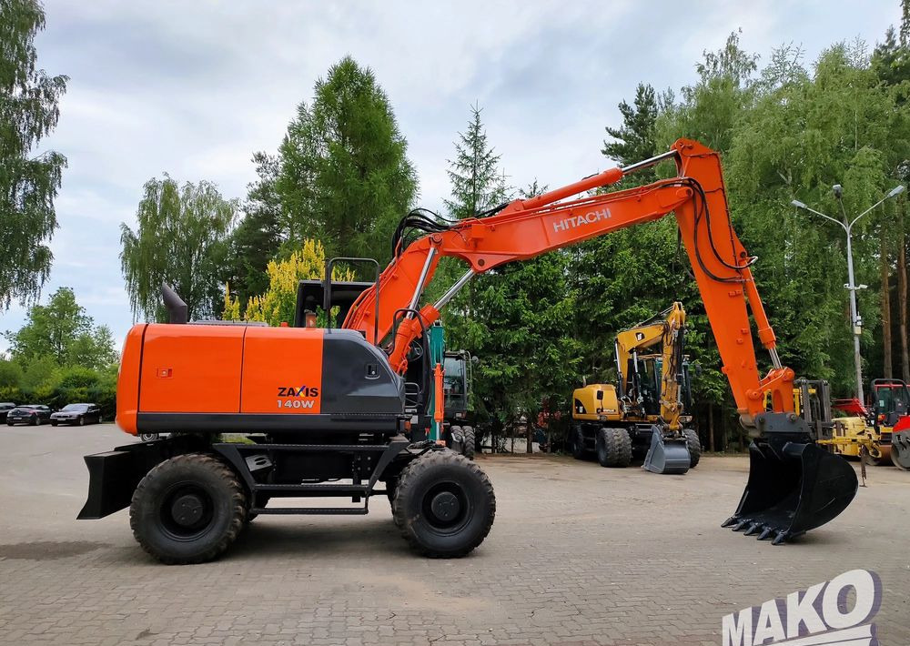 Hitachi ZX 140 - حفارة على عجلات: صور 5 Hitachi ZX 140 - حفارة على عجلات: صور 5