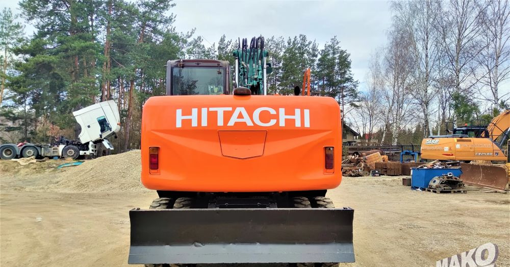 Hitachi ZX140W-3 - حفارة على عجلات: صور 3 Hitachi ZX140W-3 - حفارة على عجلات: صور 3