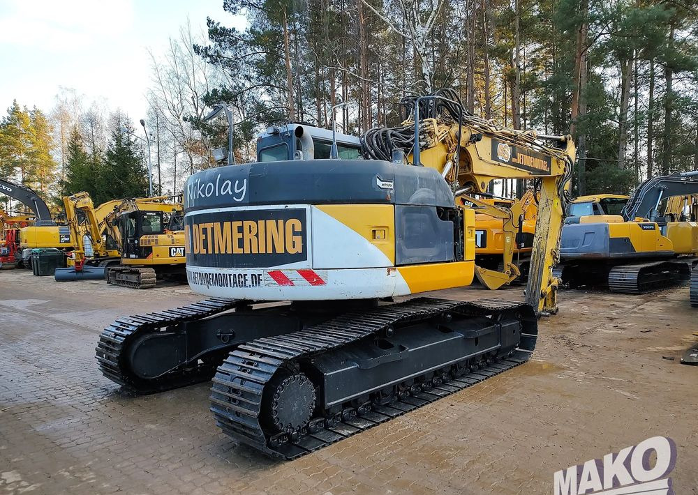 Komatsu PC228USLC-3 - حفارات زحافة: صور 4 Komatsu PC228USLC-3 - حفارات زحافة: صور 4