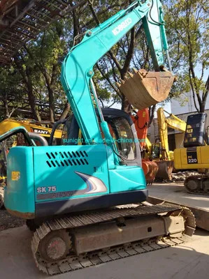 Second Hand Mini Hydraulic Excavator Kobelco Sk75 Excavator with Blade for Sale - حفارات زحافة: صور 1 Second Hand Mini Hydraulic Excavator Kobelco Sk75 Excavator with Blade for Sale - حفارات زحافة: صور 1