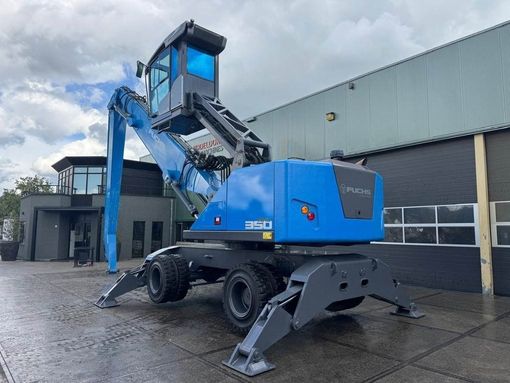 Fuchs MHL 350 S5 - حفارة النقل والشحن: صور 3 Fuchs MHL 350 S5 - حفارة النقل والشحن: صور 3