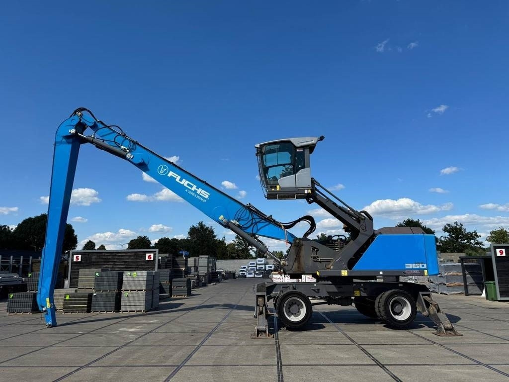 Fuchs MHL 360 T4F - حفارة النقل والشحن: صور 1 Fuchs MHL 360 T4F - حفارة النقل والشحن: صور 1