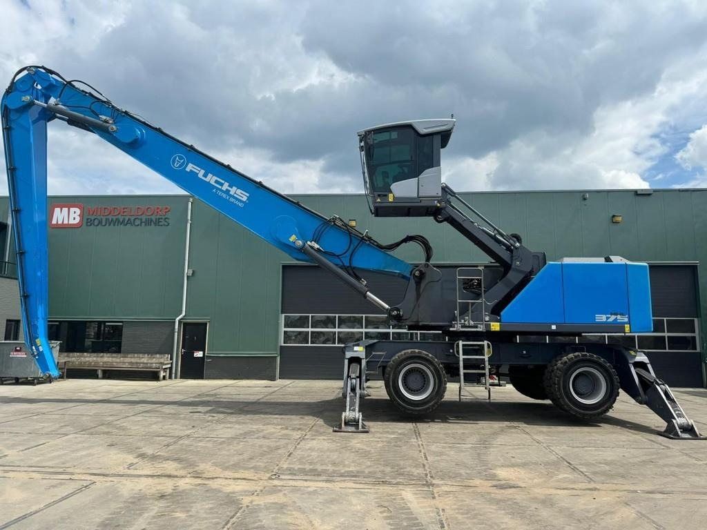 Fuchs MHL 375 S5 - حفارة النقل والشحن: صور 1 Fuchs MHL 375 S5 - حفارة النقل والشحن: صور 1