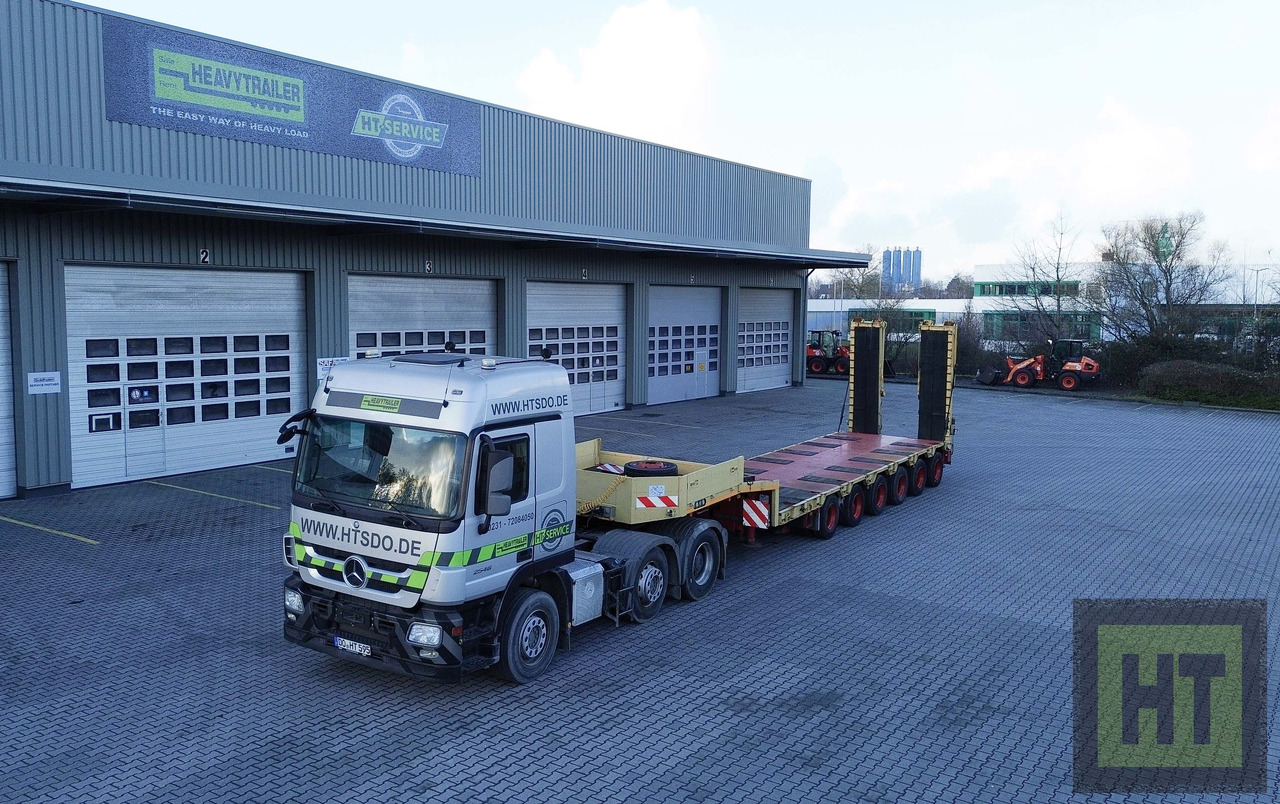 Goldhofer 6-Achs-Tele-Semi mit hydr. Rampen-zwangsgelenkt - عربة مسطحة منخفضة نصف مقطورة: صور 5 Goldhofer 6-Achs-Tele-Semi mit hydr. Rampen-zwangsgelenkt - عربة مسطحة منخفضة نصف مقطورة: صور 5