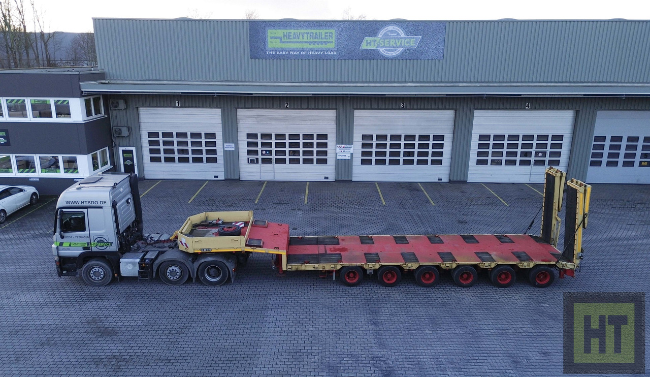 Goldhofer 6-Achs-Tele-Semi mit hydr. Rampen-zwangsgelenkt - عربة مسطحة منخفضة نصف مقطورة: صور 2 Goldhofer 6-Achs-Tele-Semi mit hydr. Rampen-zwangsgelenkt - عربة مسطحة منخفضة نصف مقطورة: صور 2