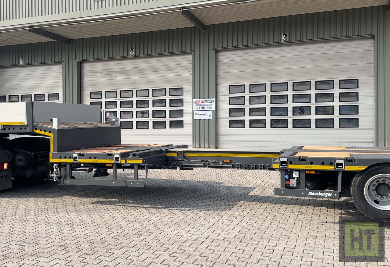 Meusburger 3-Achs-Tele-Semi mit 1 Paar Radmulden und hydr. Rampen - عربة مسطحة منخفضة نصف مقطورة: صور 4 Meusburger 3-Achs-Tele-Semi mit 1 Paar Radmulden und hydr. Rampen - عربة مسطحة منخفضة نصف مقطورة: صور 4