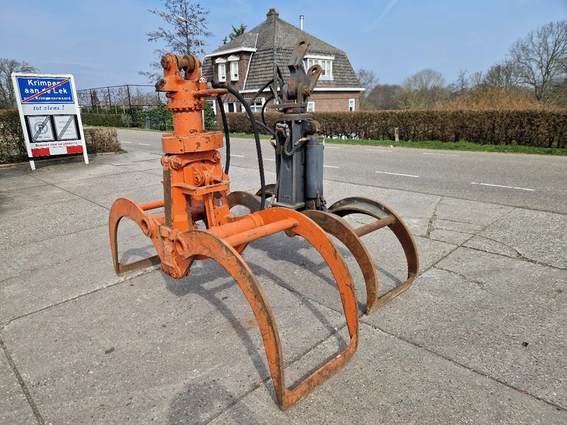 O & K en Atlas hydraulische bomenklemmen - مخلبي - معدات الغابات: صور 1 O & K en Atlas hydraulische bomenklemmen - مخلبي - معدات الغابات: صور 1