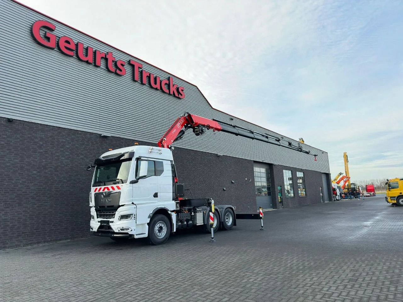 MAN TGX 33.520 6X4 TREKKER-BAKWAGEN COMBI + FASSI F4 - شاحنة كرين: صور 2 MAN TGX 33.520 6X4 TREKKER-BAKWAGEN COMBI + FASSI F4 - شاحنة كرين: صور 2