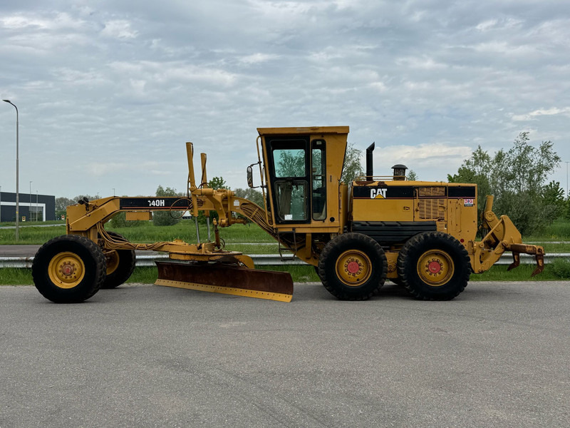 Caterpillar 140H - آلة تسوية الأرض: صور 1 Caterpillar 140H - آلة تسوية الأرض: صور 1