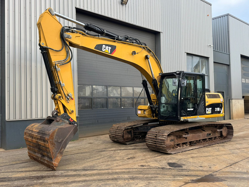 Caterpillar 319DL - حفارات زحافة: صور 2 Caterpillar 319DL - حفارات زحافة: صور 2