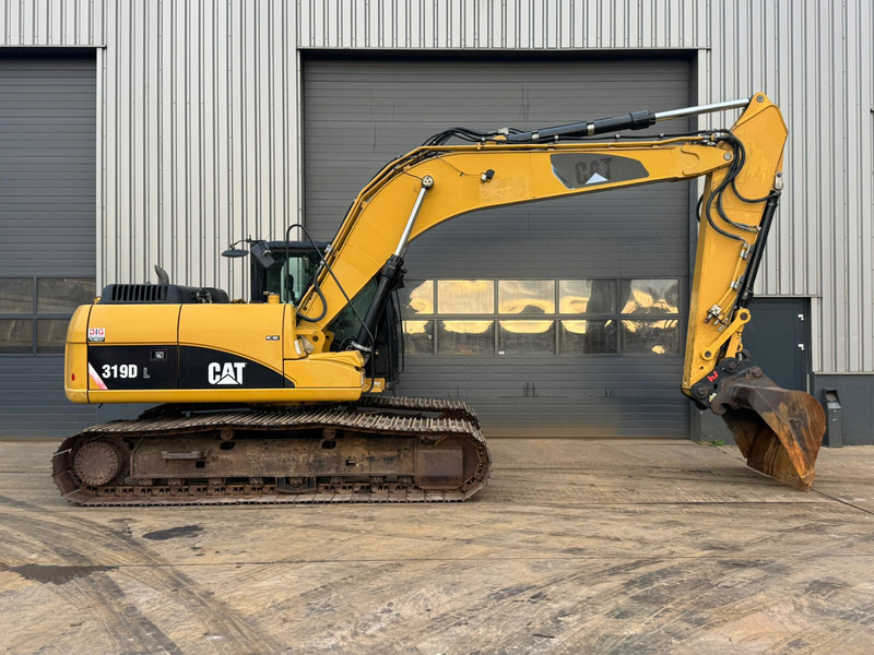 حفارات زحافة Caterpillar 319DL: صور 6