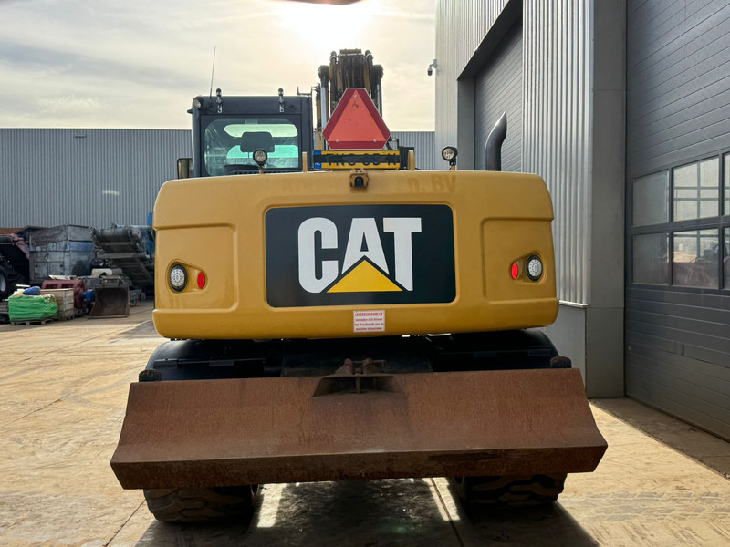 Caterpillar M313D - CE - حفارة على عجلات: صور 4 Caterpillar M313D - CE - حفارة على عجلات: صور 4