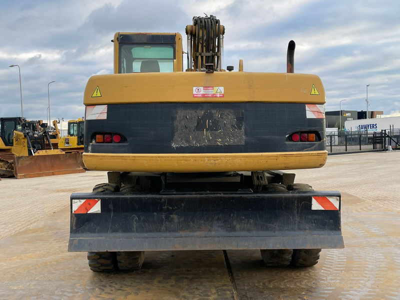 Caterpillar M318C - حفارة على عجلات: صور 4 Caterpillar M318C - حفارة على عجلات: صور 4