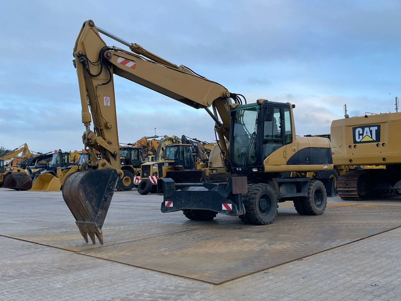 Caterpillar M318C - حفارة: صور 2 Caterpillar M318C - حفارة: صور 2