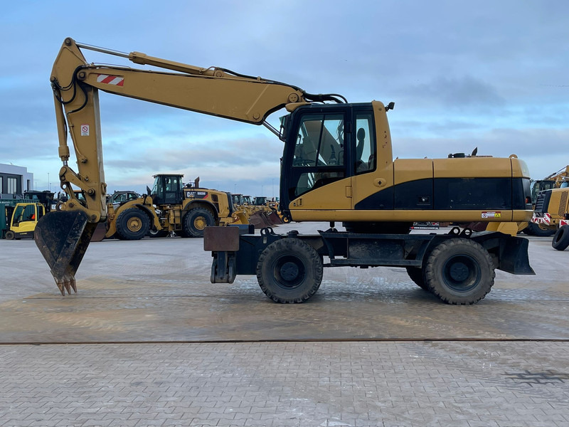 Caterpillar M318C - حفارة: صور 1 Caterpillar M318C - حفارة: صور 1