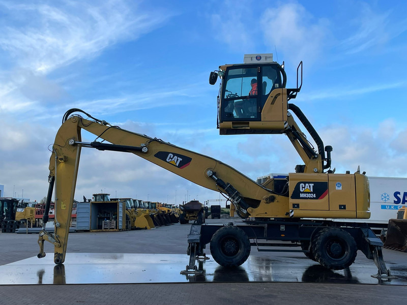 Caterpillar MH3024 - حفارة على عجلات: صور 1 Caterpillar MH3024 - حفارة على عجلات: صور 1