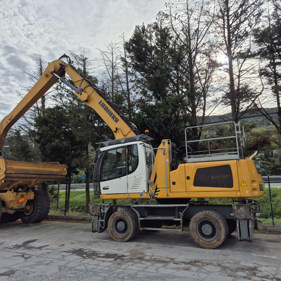 LIEBHERR LH30M - حفارة النقل والشحن: صور 1 LIEBHERR LH30M - حفارة النقل والشحن: صور 1